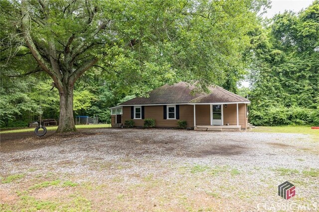 451 N Woodlawn Dr, Crawford, GA 30630 - ranch-style house featuring covered porch