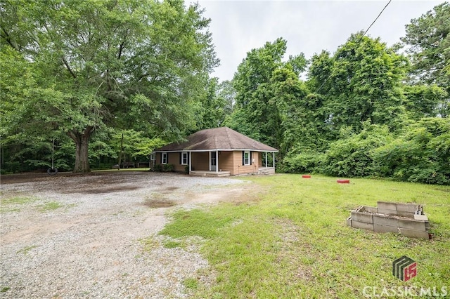 451 N Woodlawn Dr, Crawford, GA 30630 - view of front of home featuring a porch and a front yard