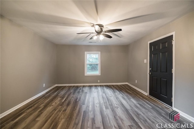 451 N Woodlawn Dr, Crawford, GA 30630 - empty room featuring dark wood-style flooring, baseboards, ceiling fan, and visible vents