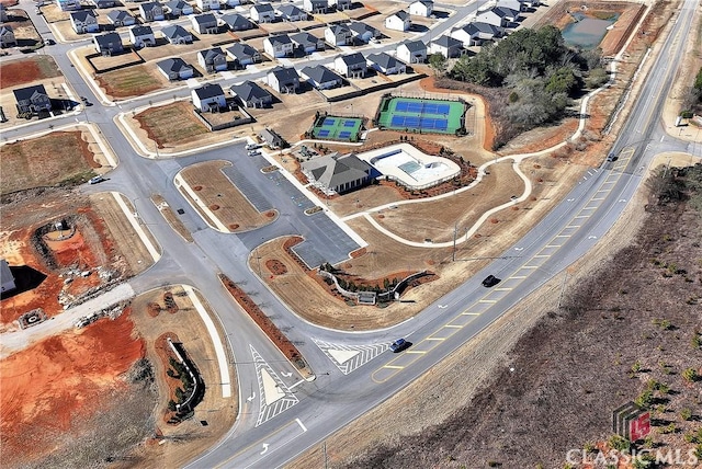 birds eye view of property with a residential view