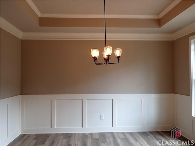 41 Hometown Ct, Jefferson, GA 30549 - unfurnished room featuring a chandelier, a raised ceiling, a decorative wall, and crown molding