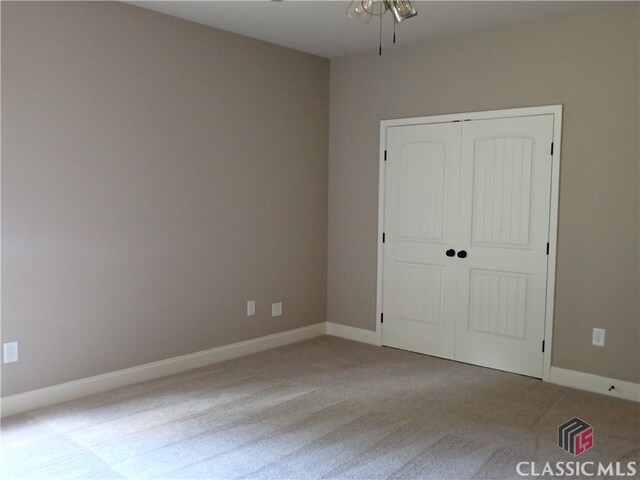 41 Hometown Ct, Jefferson, GA 30549 - carpeted empty room with a ceiling fan and baseboards