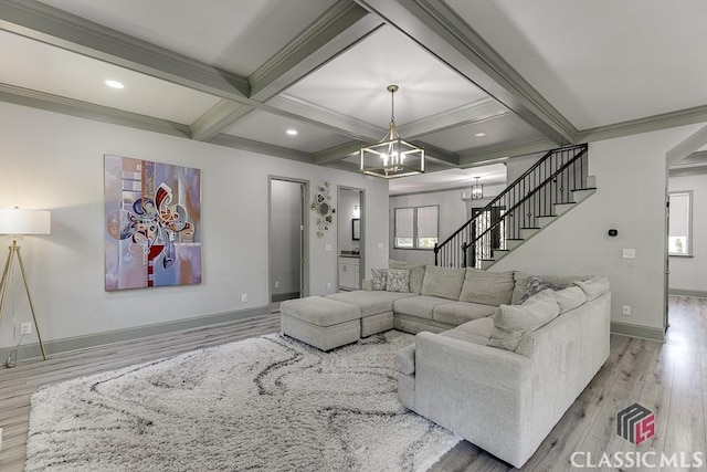 4208 Sierra Creek Ct, Hoschton, GA 30548 - living area with wood finished floors, a chandelier, coffered ceiling, baseboards, and stairway