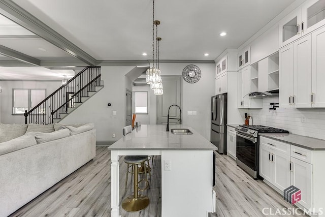 4208 Sierra Creek Ct, Hoschton, GA 30548 - kitchen featuring a sink, appliances with stainless steel finishes, light wood-style floors, backsplash, and recessed lighting