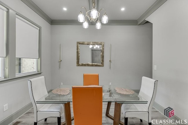 4208 Sierra Creek Ct, Hoschton, GA 30548 - dining space with crown molding, wood finished floors, a chandelier, and baseboards