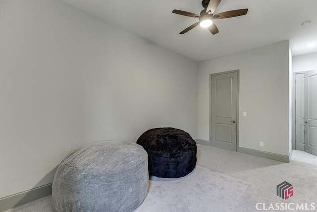 4208 Sierra Creek Ct, Hoschton, GA 30548 - sitting room featuring a ceiling fan, baseboards, and carpet