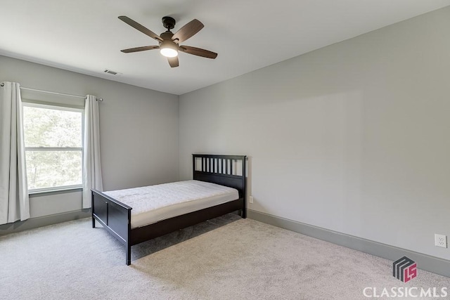 4208 Sierra Creek Ct, Hoschton, GA 30548 - carpeted bedroom featuring baseboards and ceiling fan