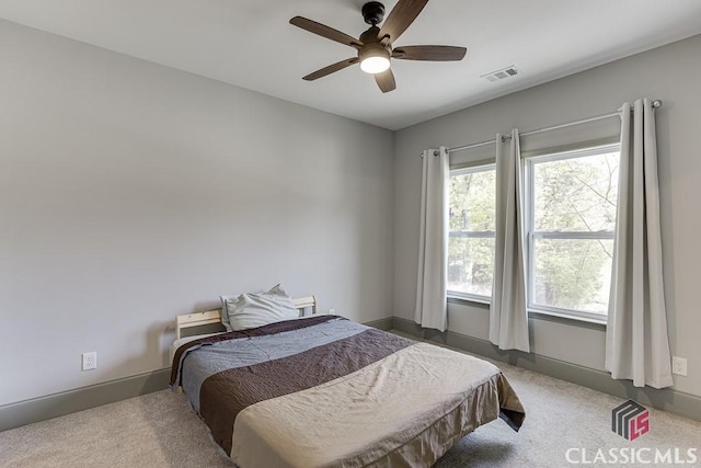 4208 Sierra Creek Ct, Hoschton, GA 30548 - bedroom with carpet floors, a ceiling fan, and baseboards