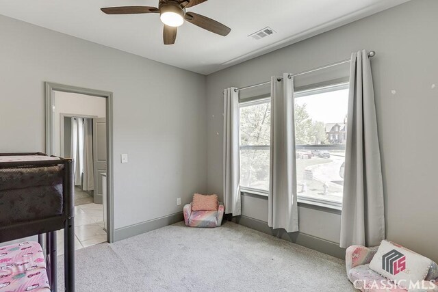 4208 Sierra Creek Ct, Hoschton, GA 30548 - bedroom featuring light colored carpet, ceiling fan, and light tile patterned floors