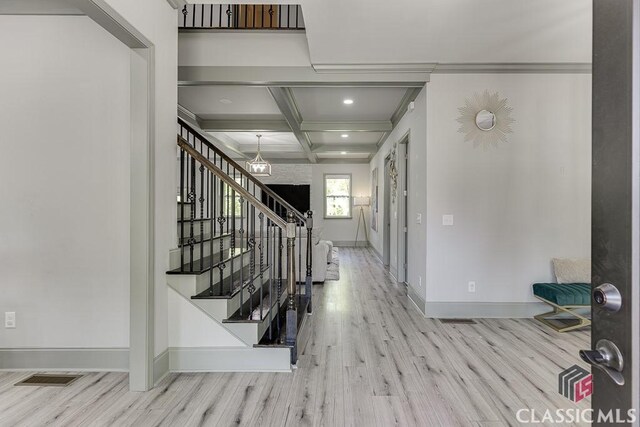 4208 Sierra Creek Ct, Hoschton, GA 30548 - foyer featuring wood finished floors, stairs, baseboards, coffered ceiling, and recessed lighting