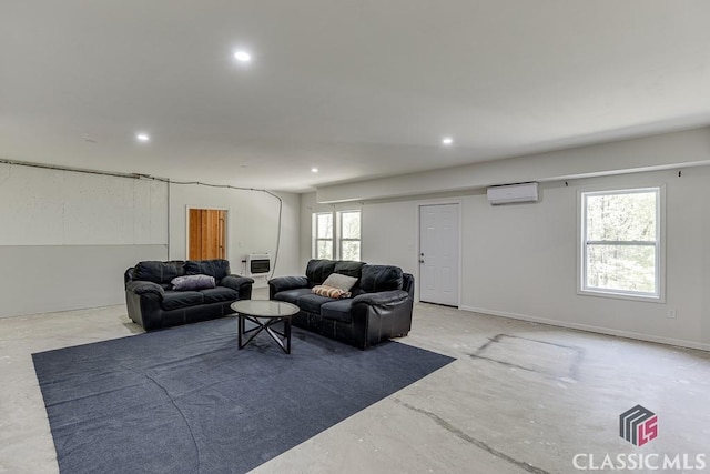 4208 Sierra Creek Ct, Hoschton, GA 30548 - living room featuring an AC wall unit, recessed lighting, heating unit, and concrete floors