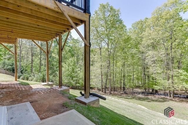 4208 Sierra Creek Ct, Hoschton, GA 30548 - view of patio featuring a forest view