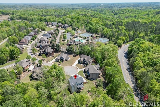 4208 Sierra Creek Ct, Hoschton, GA 30548 - view of property location featuring a heavily wooded area and nearby suburban area