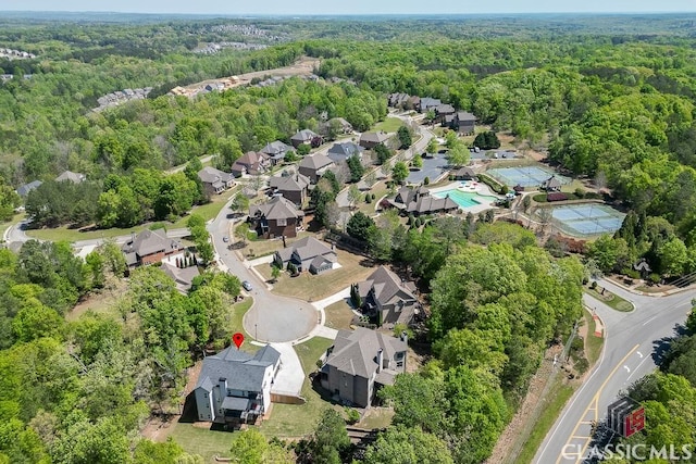 4208 Sierra Creek Ct, Hoschton, GA 30548 - view of property location with a forest and nearby suburban area