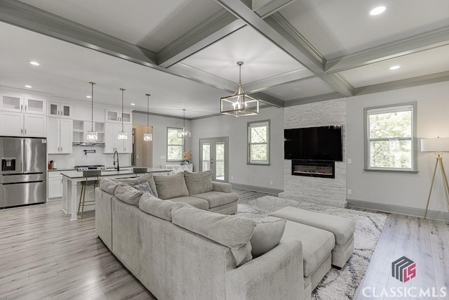 4208 Sierra Creek Ct, Hoschton, GA 30548 - living area with beamed ceiling, light wood-type flooring, recessed lighting, coffered ceiling, and crown molding