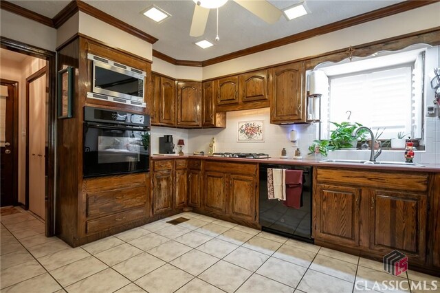 749 Diamond Hill Colbert Rd, Colbert, GA 30628 - kitchen with black appliances, a ceiling fan, a sink, and backsplash