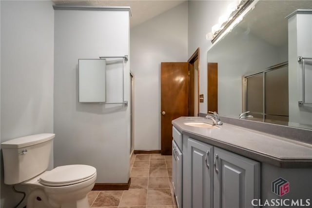 749 Diamond Hill Colbert Rd, Colbert, GA 30628 - bathroom with a shower with door, toilet, tile patterned flooring, and vanity