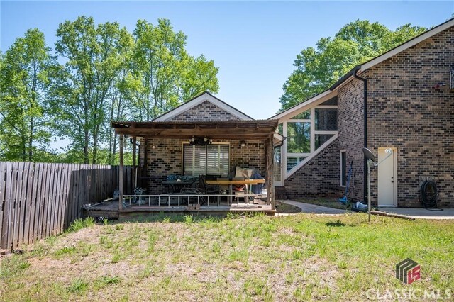 749 Diamond Hill Colbert Rd, Colbert, GA 30628 - exterior space featuring a wooden deck and a fenced backyard