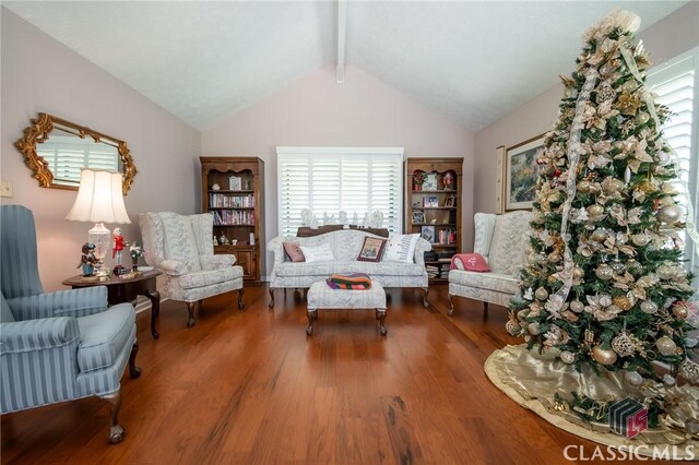 749 Diamond Hill Colbert Rd, Colbert, GA 30628 - living area with wood finished floors and lofted ceiling with beams