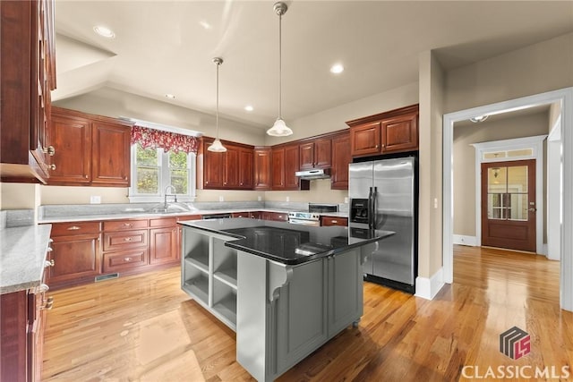 147 Rapids Dr, Bogart, GA 30622 - kitchen featuring a sink, stainless steel appliances, under cabinet range hood, a center island, and pendant lighting