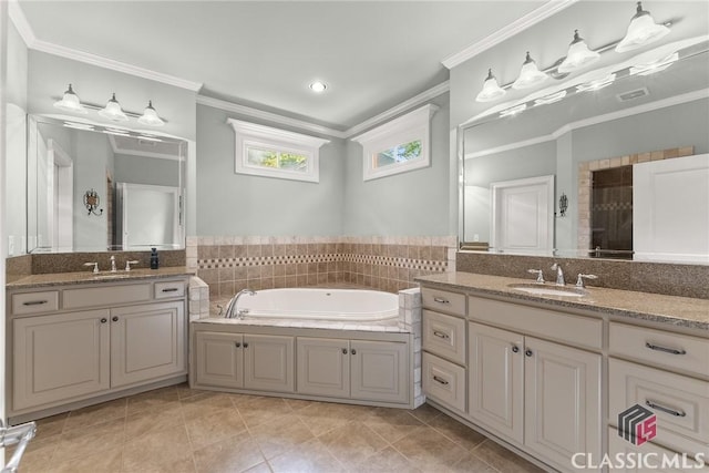 147 Rapids Dr, Bogart, GA 30622 - bathroom featuring a sink, a garden tub, two vanities, ornamental molding, and tile patterned flooring