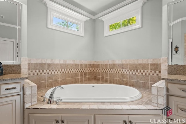 147 Rapids Dr, Bogart, GA 30622 - bathroom with crown molding, a garden tub, vanity, and plenty of natural light