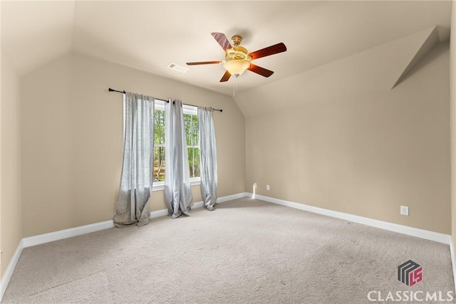 147 Rapids Dr, Bogart, GA 30622 - carpeted empty room featuring visible vents, ceiling fan, vaulted ceiling, and baseboards
