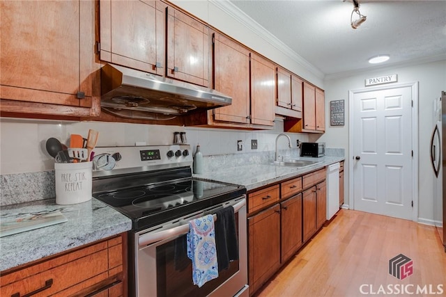 132 Tamara Ct, Athens, GA 30606 - kitchen featuring a sink, brown cabinets, stainless steel appliances, and under cabinet range hood