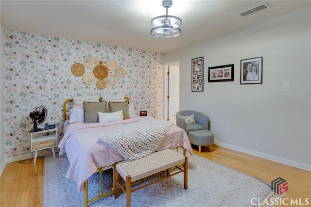 132 Tamara Ct, Athens, GA 30606 - bedroom featuring visible vents, wallpapered walls, baseboards, and light wood-type flooring