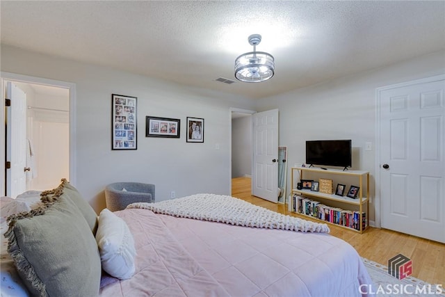 132 Tamara Ct, Athens, GA 30606 - bedroom with visible vents and light wood-style flooring