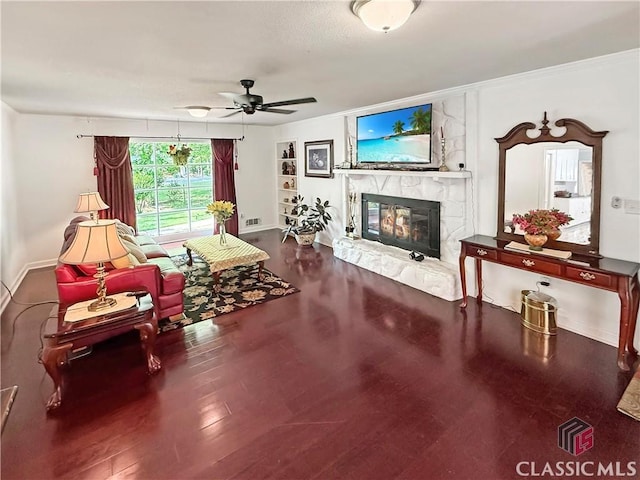 155 Broomsedge Trl, Athens, GA 30605 - living room with a ceiling fan, baseboards, wood finished floors, and a fireplace