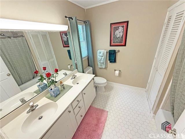 155 Broomsedge Trl, Athens, GA 30605 - bathroom with a closet, a sink, crown molding, and toilet
