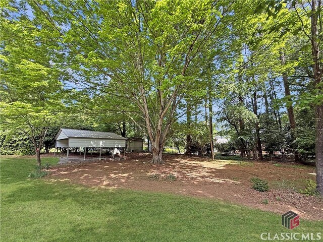 155 Broomsedge Trl, Athens, GA 30605 - view of yard with a detached carport