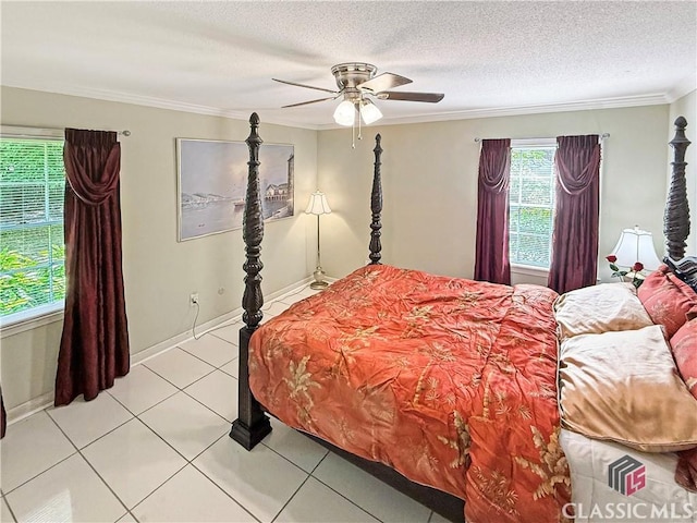 155 Broomsedge Trl, Athens, GA 30605 - bedroom featuring ornamental molding, light tile patterned flooring, baseboards, ceiling fan, and a textured ceiling