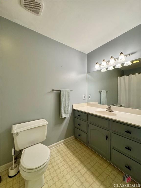 full bathroom with visible vents, baseboards, tile patterned floors, and toilet