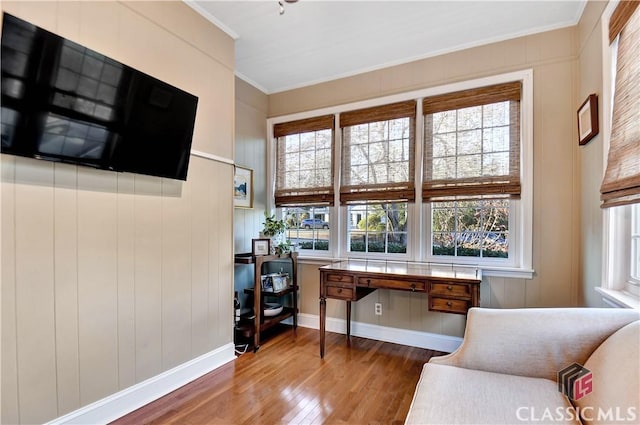 office with crown molding, baseboards, and wood finished floors