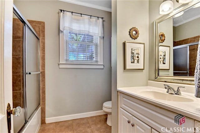 full bathroom featuring tile patterned flooring, bath / shower combo with glass door, vanity, toilet, and ornamental molding