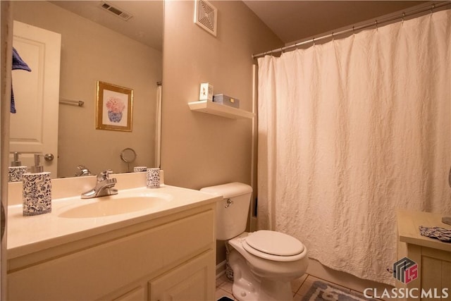 490 Barnett Shoals Rd Unit 802, Athens, GA 30605 - full bath with toilet, visible vents, tile patterned flooring, and vanity