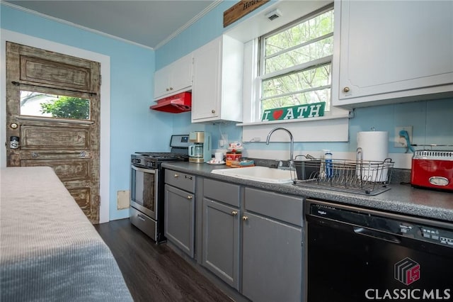 kitchen featuring crown molding, dishwasher, gas stove, a sink, and under cabinet range hood