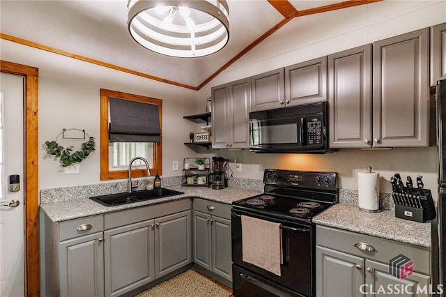 50 Atlanta Ln, Clayton, GA 30525 - kitchen featuring gray cabinets, a sink, light countertops, black appliances, and lofted ceiling