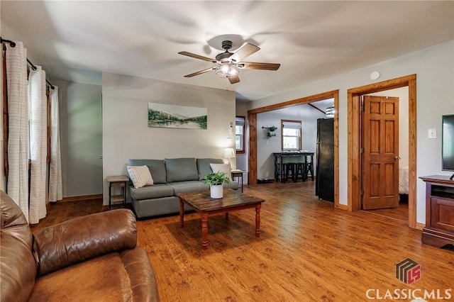 50 Atlanta Ln, Clayton, GA 30525 - living room featuring baseboards, a ceiling fan, and wood finished floors