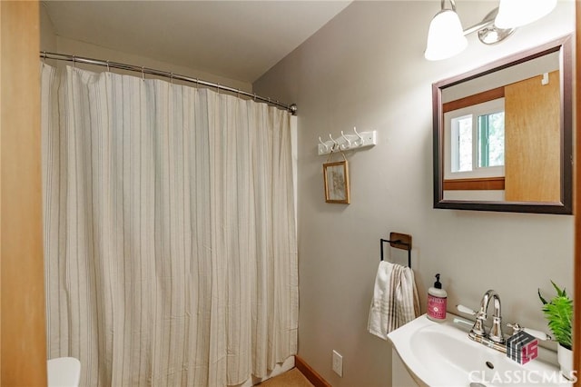 50 Atlanta Ln, Clayton, GA 30525 - bathroom with vanity, curtained shower, and toilet