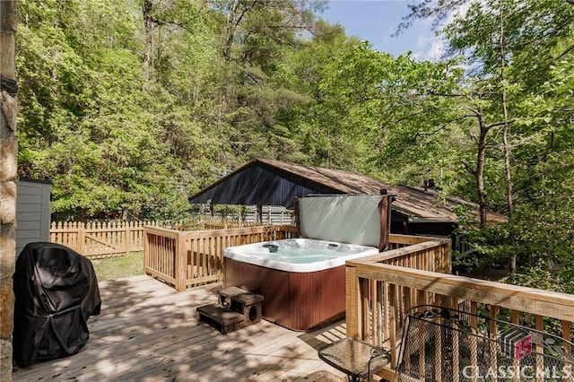 50 Atlanta Ln, Clayton, GA 30525 - wooden deck with a hot tub, fence, and a grill