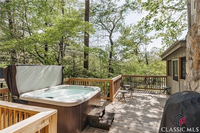 50 Atlanta Ln, Clayton, GA 30525 - wooden deck with a hot tub and a grill
