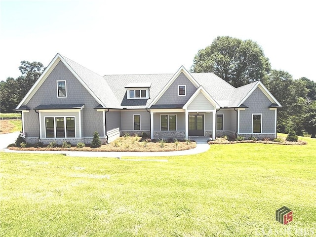 1200 Askew Trl, Greensboro, GA 30642 - craftsman-style home with a front yard, french doors, a porch, and roof with shingles