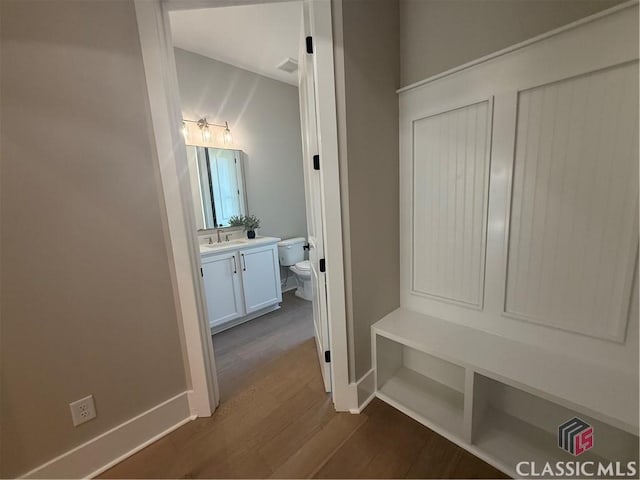 1200 Askew Trl, Greensboro, GA 30642 - mudroom with dark wood-style flooring and baseboards