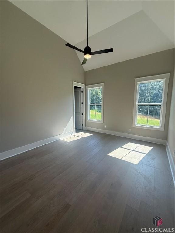 1200 Askew Trl, Greensboro, GA 30642 - spare room featuring dark wood-type flooring, ceiling fan, and high vaulted ceiling