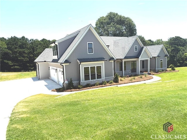 1200 Askew Trl, Greensboro, GA 30642 - craftsman inspired home featuring concrete driveway, an attached garage, a front lawn, stone siding, and roof with shingles