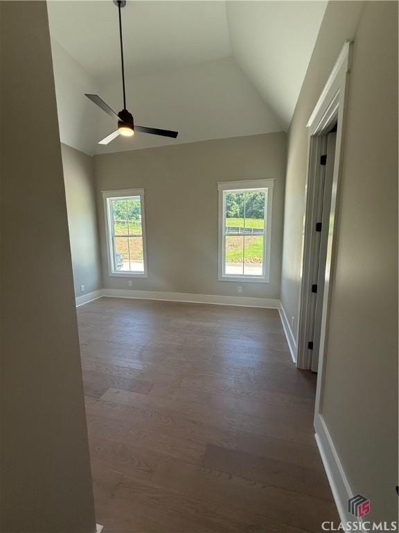 1200 Askew Trl, Greensboro, GA 30642 - empty room featuring lofted ceiling, dark wood-type flooring, and a ceiling fan