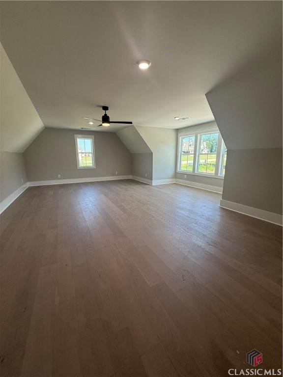 1200 Askew Trl, Greensboro, GA 30642 - additional living space with vaulted ceiling, plenty of natural light, a ceiling fan, dark wood-style flooring, and recessed lighting
